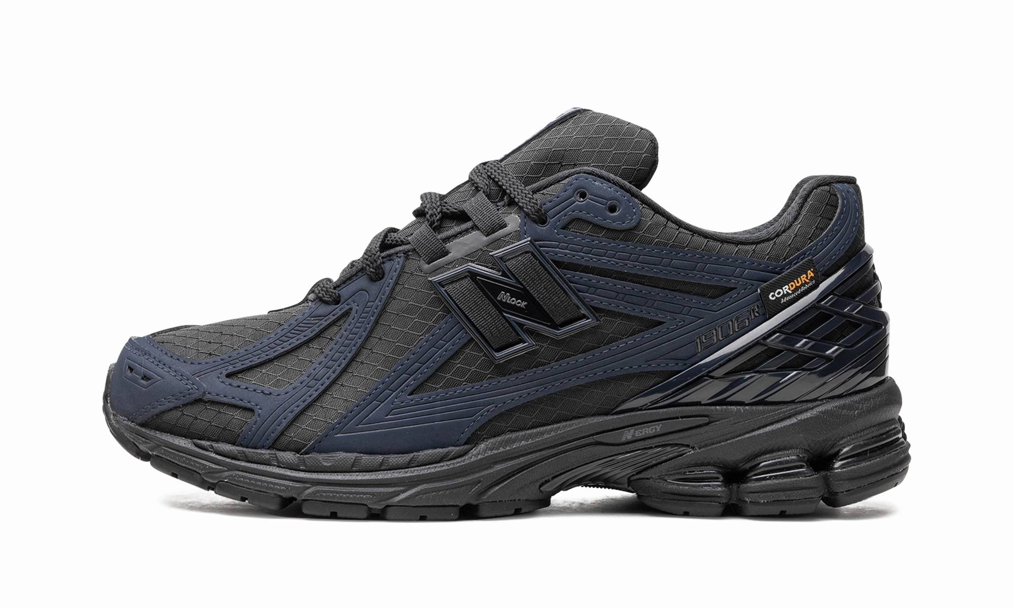 1906R "Outerspace/Black/Black" Multi Density running in a tropical area