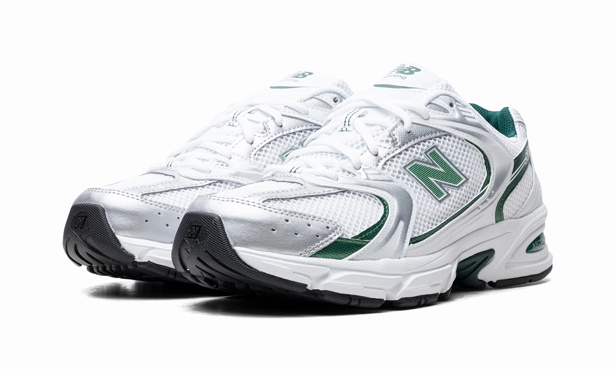 530 "Nightwatch Green" running in a rope bridge area shoes Midfoot Wrap Tech