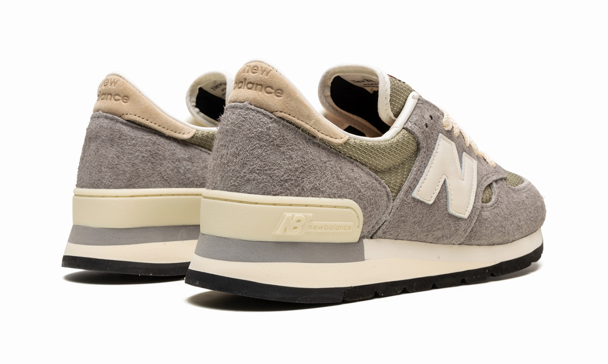 990 V1 "Made In USA - Teddy Santis" running in an urban area shoes